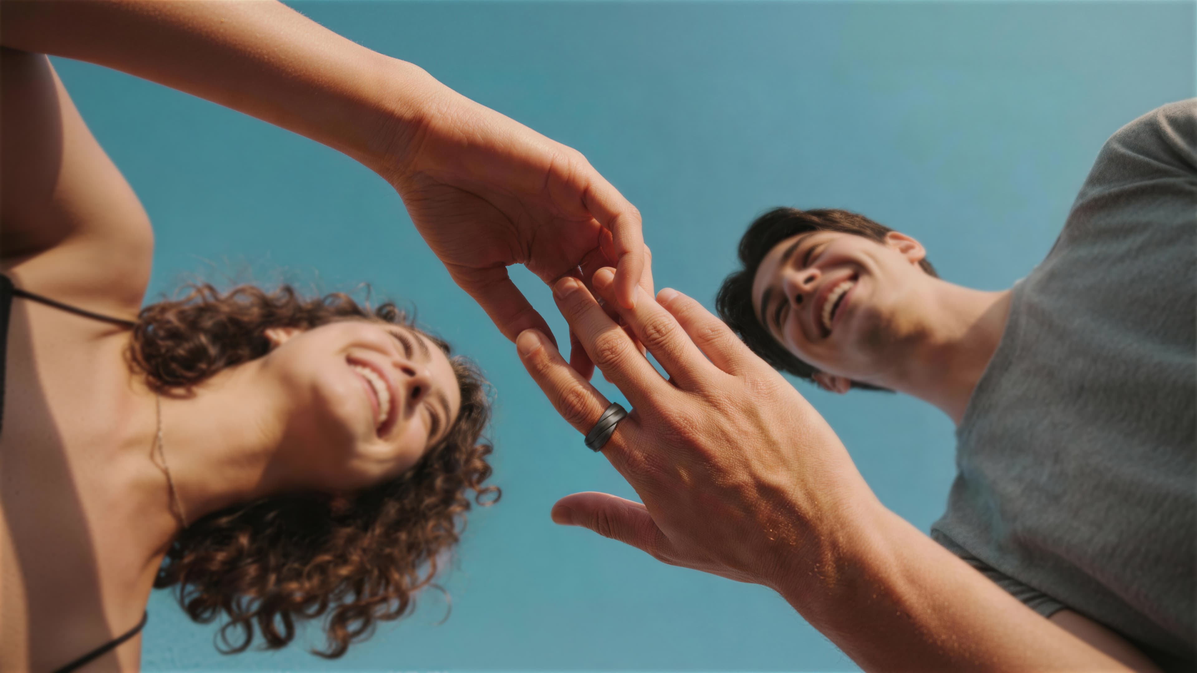 A couple sharing a joyful Glorify Ring moment